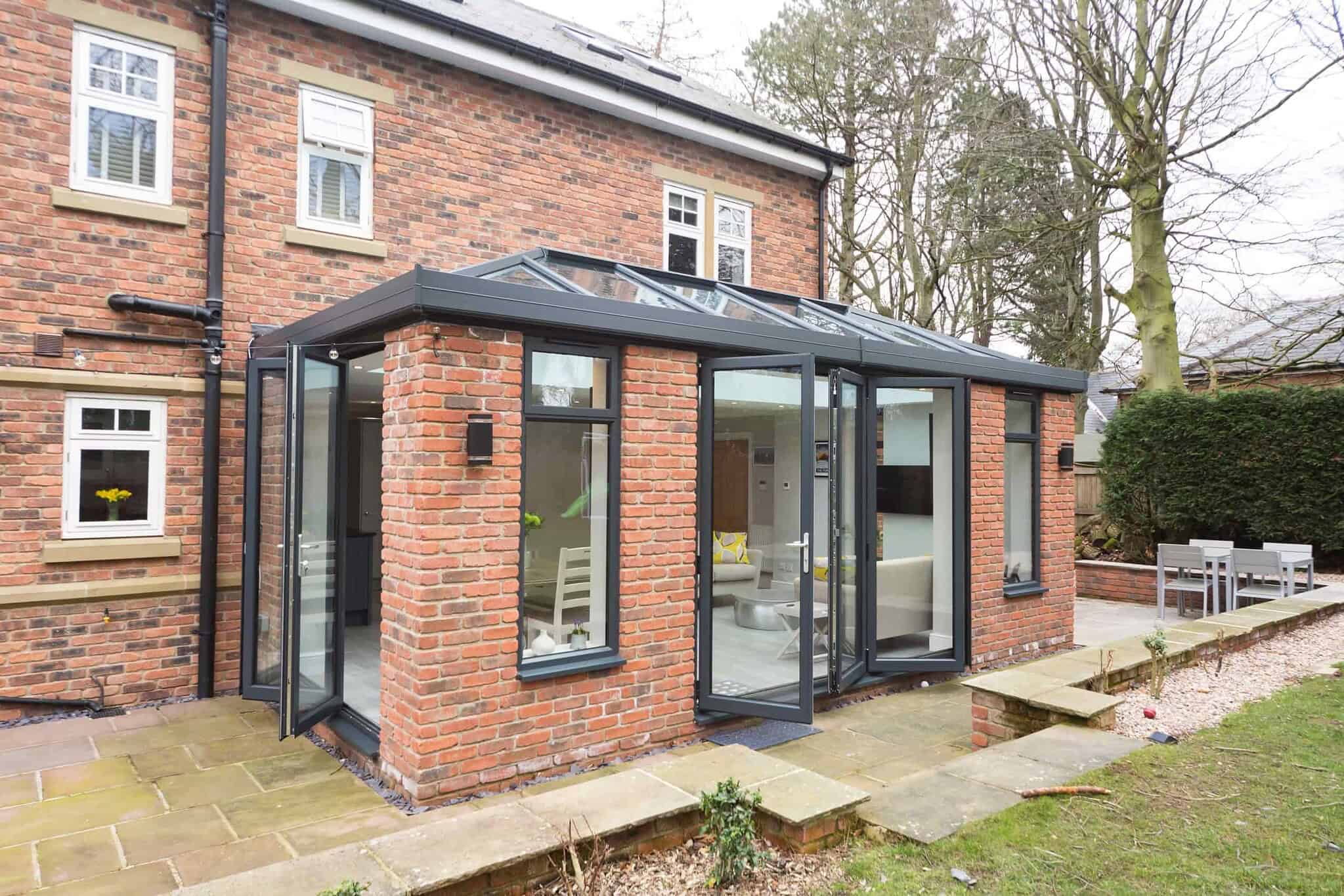 Modern brick extension with glass conservatory in Poole & Bournemouth.